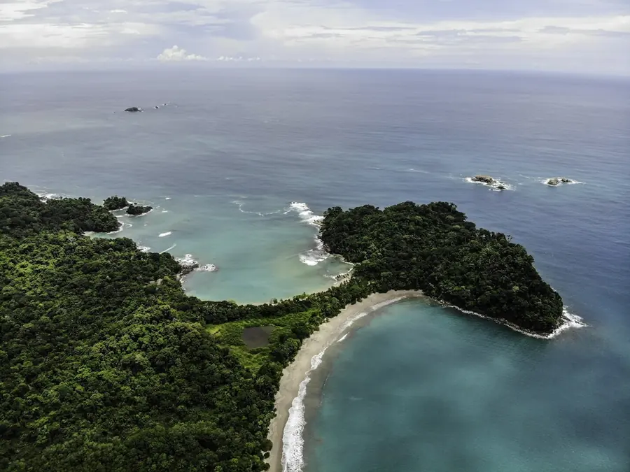 Aerial view of the beaches of Manuel Antonio surrounded by rainforest