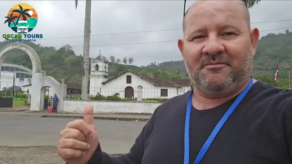 Oscar Calvo in front of the colonial church of Orosi